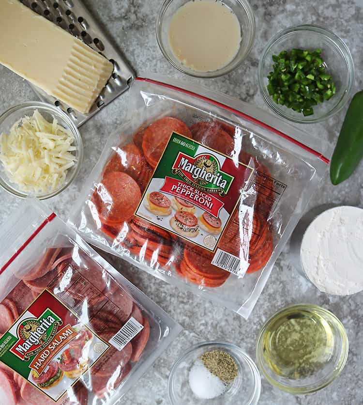 Flat lay of Ingredients For Homemade Pepperoni Cheddar Jalapeno Crackers