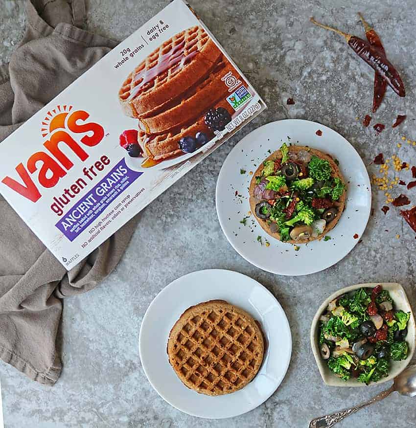 Well-toasted Van’s® Gluten Free Ancient Grains Waffles topped with a sautéed mix of kale, broccoli, onion, sundried tomatoes, mushrooms and olives.